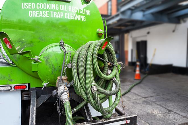 industrial pump clearing a grease trap in Mequon